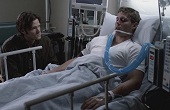 Sam watching Dean, unconscious...